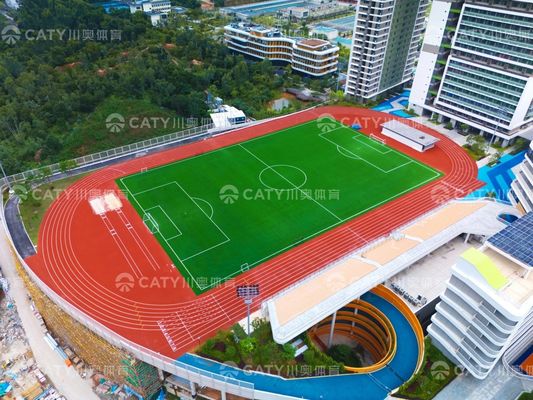 Sistema Sandwich Spray Coating pista di corsa per il campionato universitario