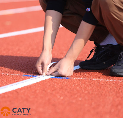 Superfici di pista all'aperto senza cuciture 400m Materiale di pista di corsa Granuli EPDM con installazione su pista atletica